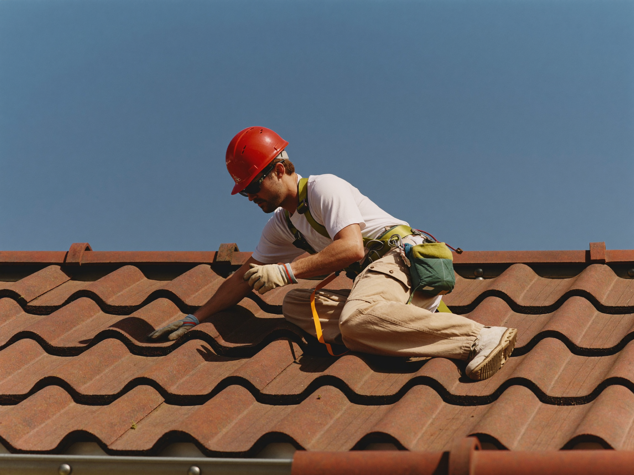 Residential roofing system with durable shingles, clean rooflines and carefully finished edges