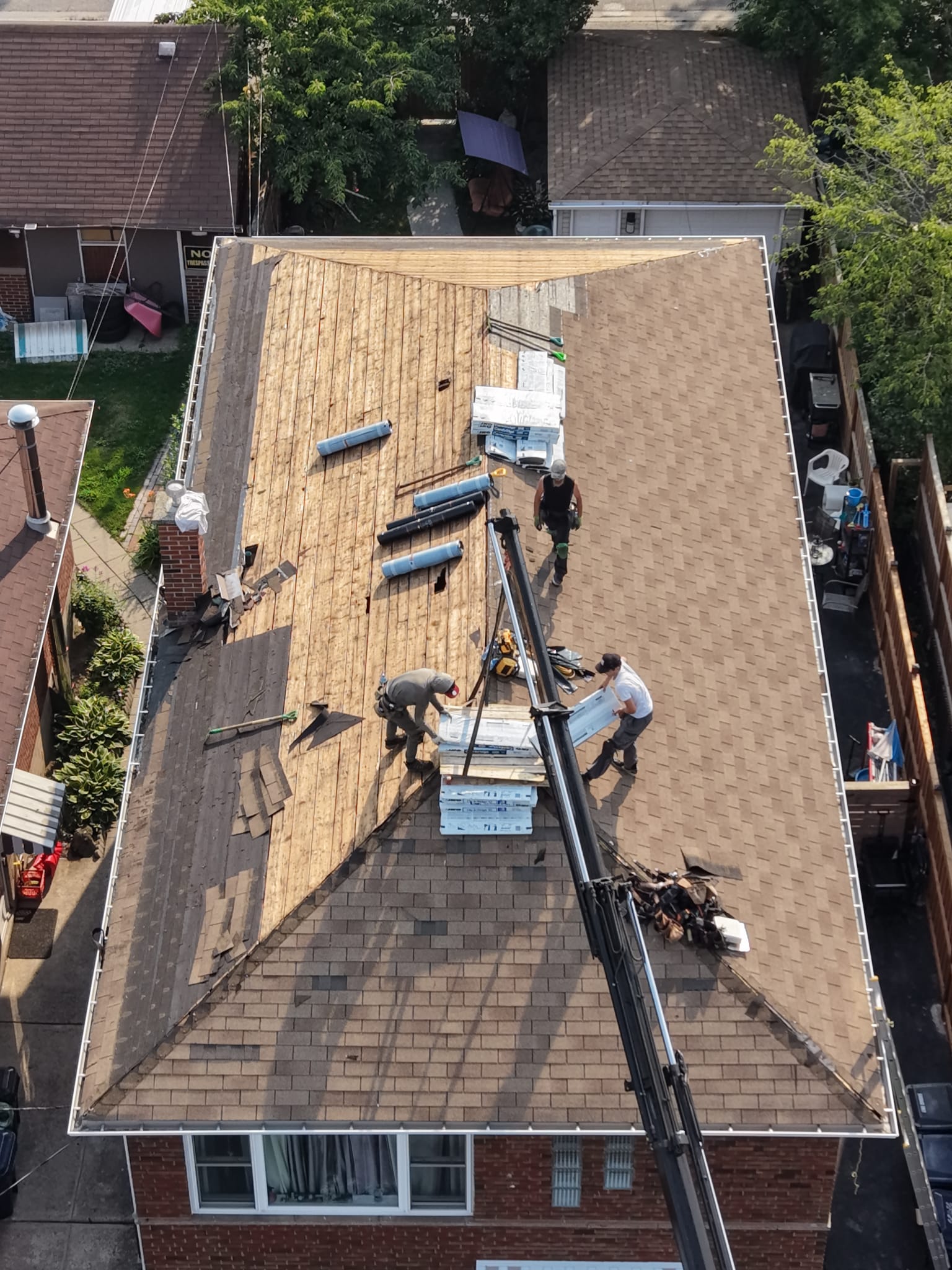 Roofing inspection and project planning with attention to shingles, flashing and drainage