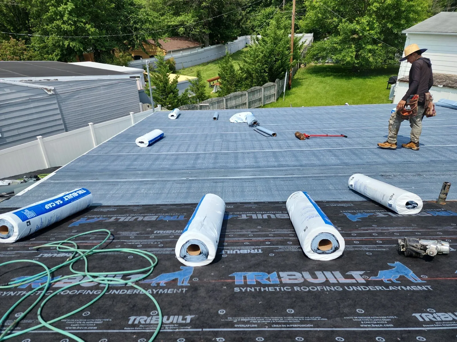 Well-maintained residential roof with finished edges and coordinated exterior details